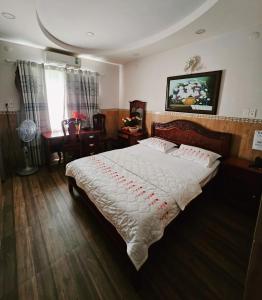 Ένα ή περισσότερα κρεβάτια σε δωμάτιο στο SaoMai Hotel - Khách Sạn SaoMai