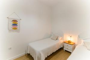 Ένα ή περισσότερα κρεβάτια σε δωμάτιο στο Villa Emilia