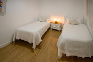 Ένα ή περισσότερα κρεβάτια σε δωμάτιο στο Villa Emilia