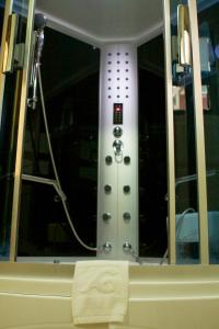 a close up of a shower in a hospital room at AG Hotel Gondar in Gonder