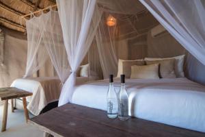 Postel nebo postele na pokoji v ubytování Art Village Tulum