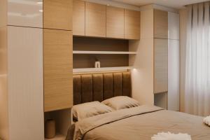 Apartmani "AS"客房内的一张或多张床位