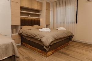 Apartmani "AS"客房内的一张或多张床位