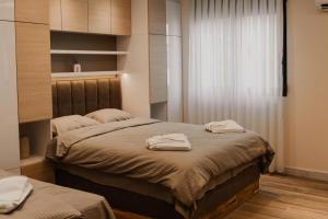 Apartmani "AS"客房内的一张或多张床位