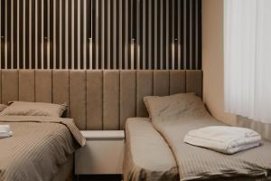Apartmani "AS"客房内的一张或多张床位