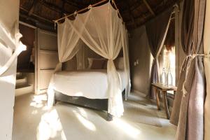 Postel nebo postele na pokoji v ubytování Art Village Tulum