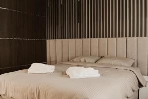 Apartmani "AS"客房内的一张或多张床位