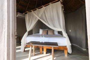 Postel nebo postele na pokoji v ubytování Art Village Tulum