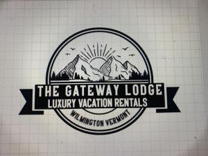 a logo for the gateway lodge luxury vacation rentals at Luxury 1 Bedroom Lodge Unit 301 in Wilmington