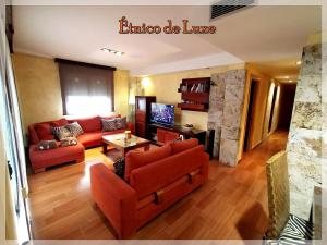 Μια τηλεόραση ή/και κέντρο ψυχαγωγίας στο ETNICO DE LUXE wifi y aparcamiento gratis