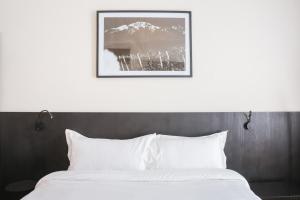 Cama ou camas em um quarto em Main By Babel