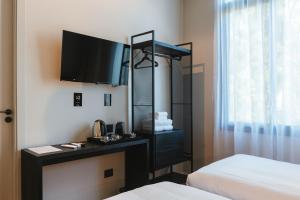 Cama ou camas em um quarto em Main By Babel