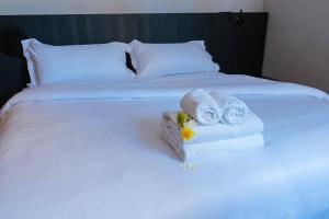 Cama ou camas em um quarto em Main By Babel