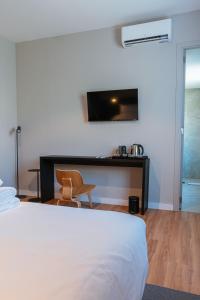 Cama ou camas em um quarto em Main By Babel