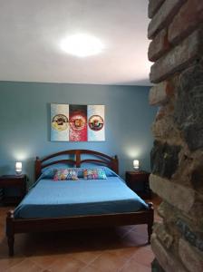 Postel nebo postele na pokoji v ubytování Agriturismo Meridiana