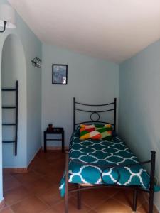 Postel nebo postele na pokoji v ubytování Agriturismo Meridiana