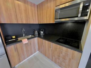 Η κουζίνα ή μικρή κουζίνα στο Oasis Retreat at Life Bucerias - Zona Dorada