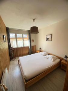 Posteľ alebo postele v izbe v ubytovaní Résidence Maison Vercors - Nouveauté en plein coeur du Village Trois pièces MAE-3774 + 6 fotografií