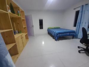Postel nebo postele na pokoji v ubytování R V R apartment