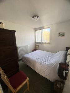 Posteľ alebo postele v izbe v ubytovaní Résidence Les Gemeaux I - Appartement trois pièces au coeur du village MAE-2304