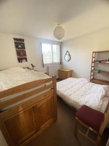 Posteľ alebo postele v izbe v ubytovaní Résidence Les Gemeaux I - Appartement trois pièces au coeur du village MAE-2304