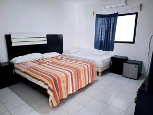 Postel nebo postele na pokoji v ubytování Samba rooms