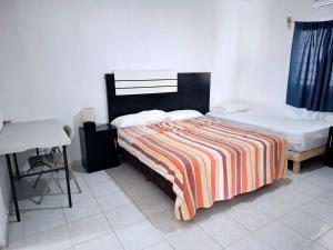 Postel nebo postele na pokoji v ubytování Samba rooms