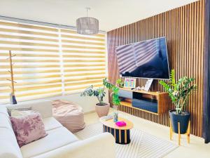 Μια τηλεόραση ή/και κέντρο ψυχαγωγίας στο Natural Home San Cristobal T