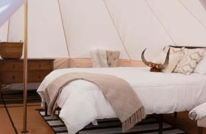 Voodi või voodid majutusasutuse Natures Nest toas