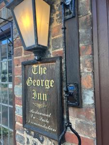 Certifikát, hodnocení, plakát nebo jiný dokument vystavený v ubytování The George Inn