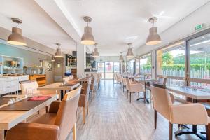 Un restaurant sau alt loc unde se poate mânca la Atoll Hotel Logis Angers, Beaucouzé
