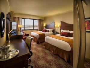 Säng eller sängar i ett rum på Choctaw Casino Resort - Durant