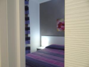 A bed or beds in a room at Le casette del generale