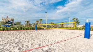 a volleyball court with a volley ball net on a beach at BRL4805 in Orange Park