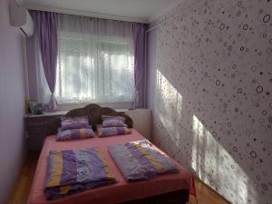 Posteľ alebo postele v izbe v ubytovaní Rovin