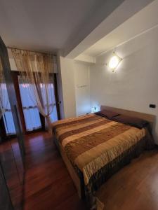Una cama o camas en una habitación de La Casina Delle Api