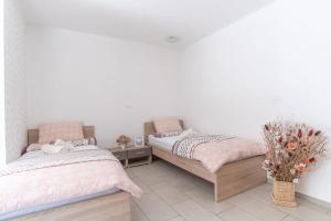 Letto o letti in una camera di Guest House Rosi