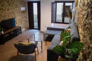 Telewizja i/lub zestaw kina domowego w obiekcie Casa Rural Doña Sol