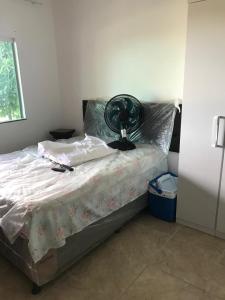 Postel nebo postele na pokoji v ubytování Casa de praia