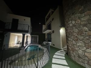 Bazén v ubytování Macarena Guest House nebo v jeho okolí