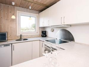 Kuchyň nebo kuchyňský kout v ubytování Luxury Retreat in Als - By Traum Ferienwohnungen