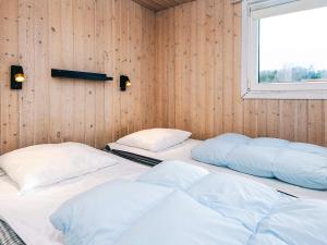 Postel nebo postele na pokoji v ubytování Luxury Retreat in Als - By Traum Ferienwohnungen