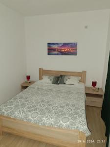 Ένα ή περισσότερα κρεβάτια σε δωμάτιο στο More i Vuk