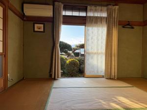 Fotografie z fotogalerie ubytování いしづち安藤家 v destinaci Saijo