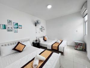 Postel nebo postele na pokoji v ubytování Hotel Đông Nhi