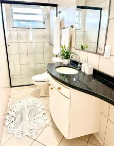 Koupelna v ubytování Residencial Baía Norte + 13 fotografií