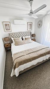 Voodi või voodid majutusasutuse Beach Bungalow Yeppoon toas