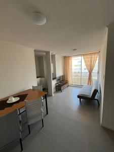 Χώρος καθιστικού στο Departamento equipado 302 Ovalle