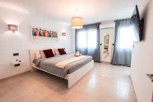 Ένα ή περισσότερα κρεβάτια σε δωμάτιο στο Luxurious Apartment in Javea near Beach