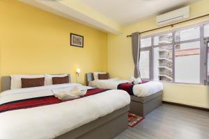 Postel nebo postele na pokoji v ubytování Thamel Hotel & Spa